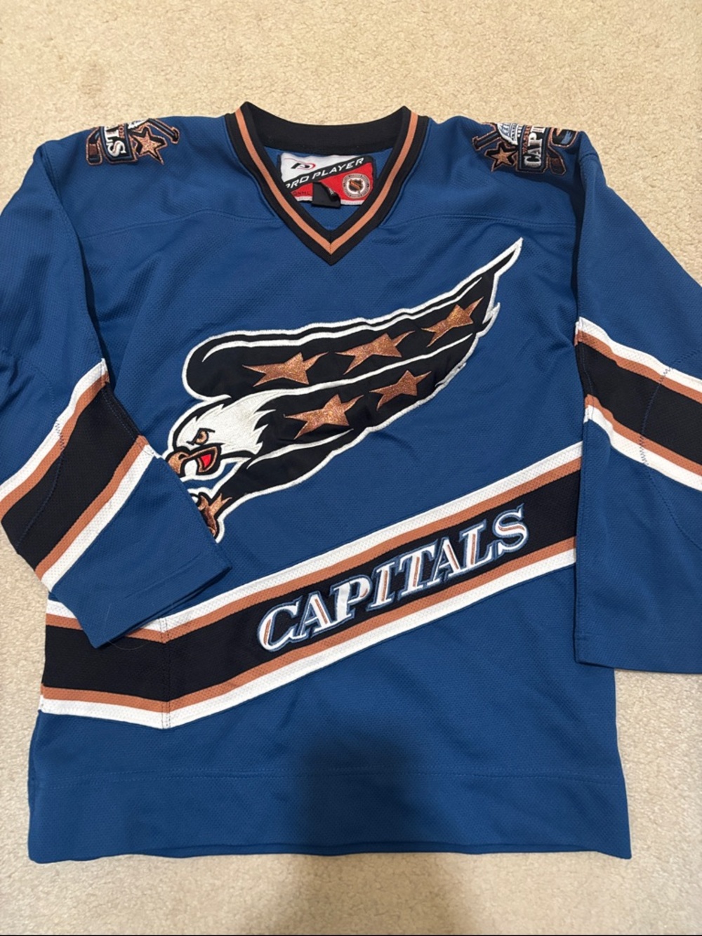 Pro Player Blue Capitals Hockey Jersey with Black and White Accents